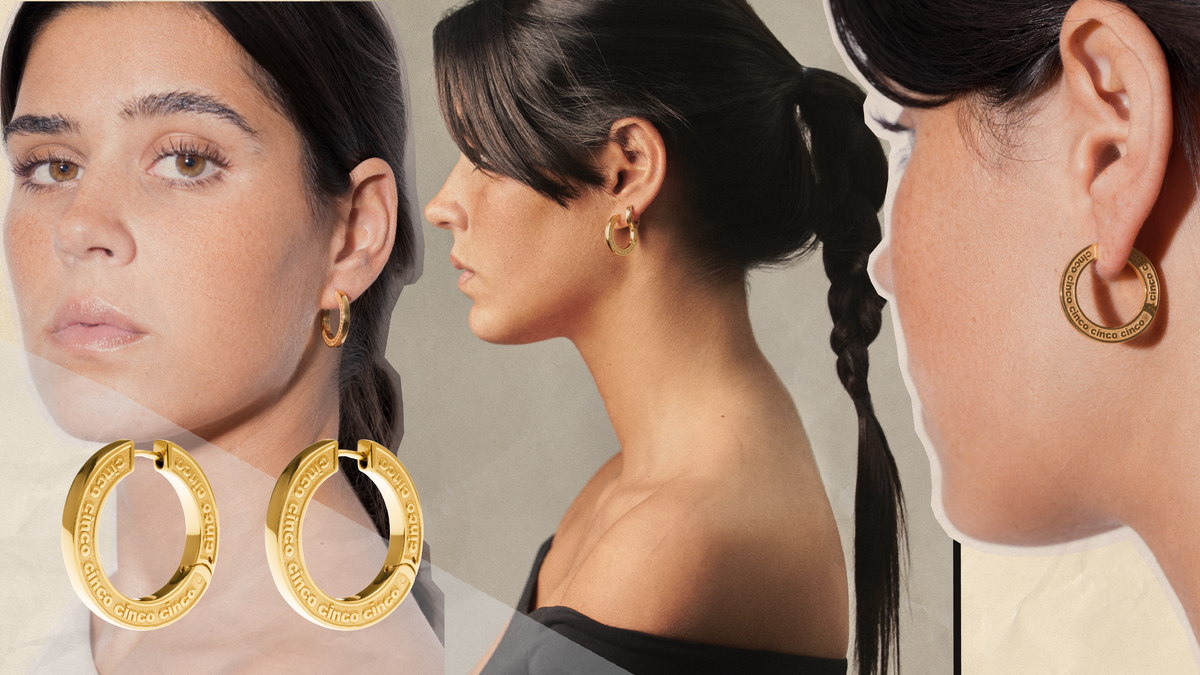 Close-up of a woman wearing gold hoop earrings, highlighting the importance of personalized jewelry.
