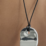 model wearing calin necklace in silver