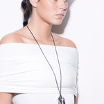 model wearing calin necklace in silver