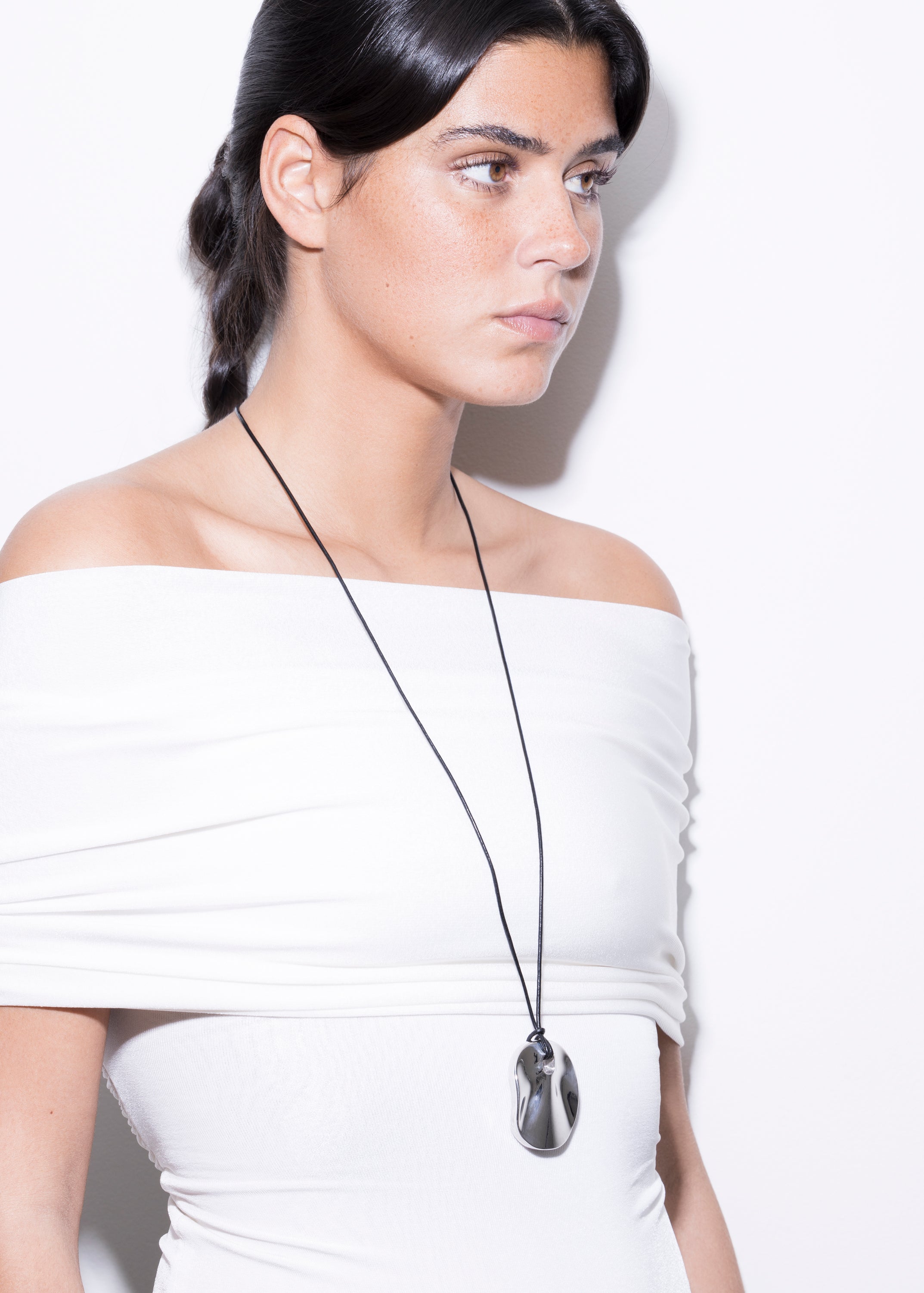model wearing calin necklace in silver
