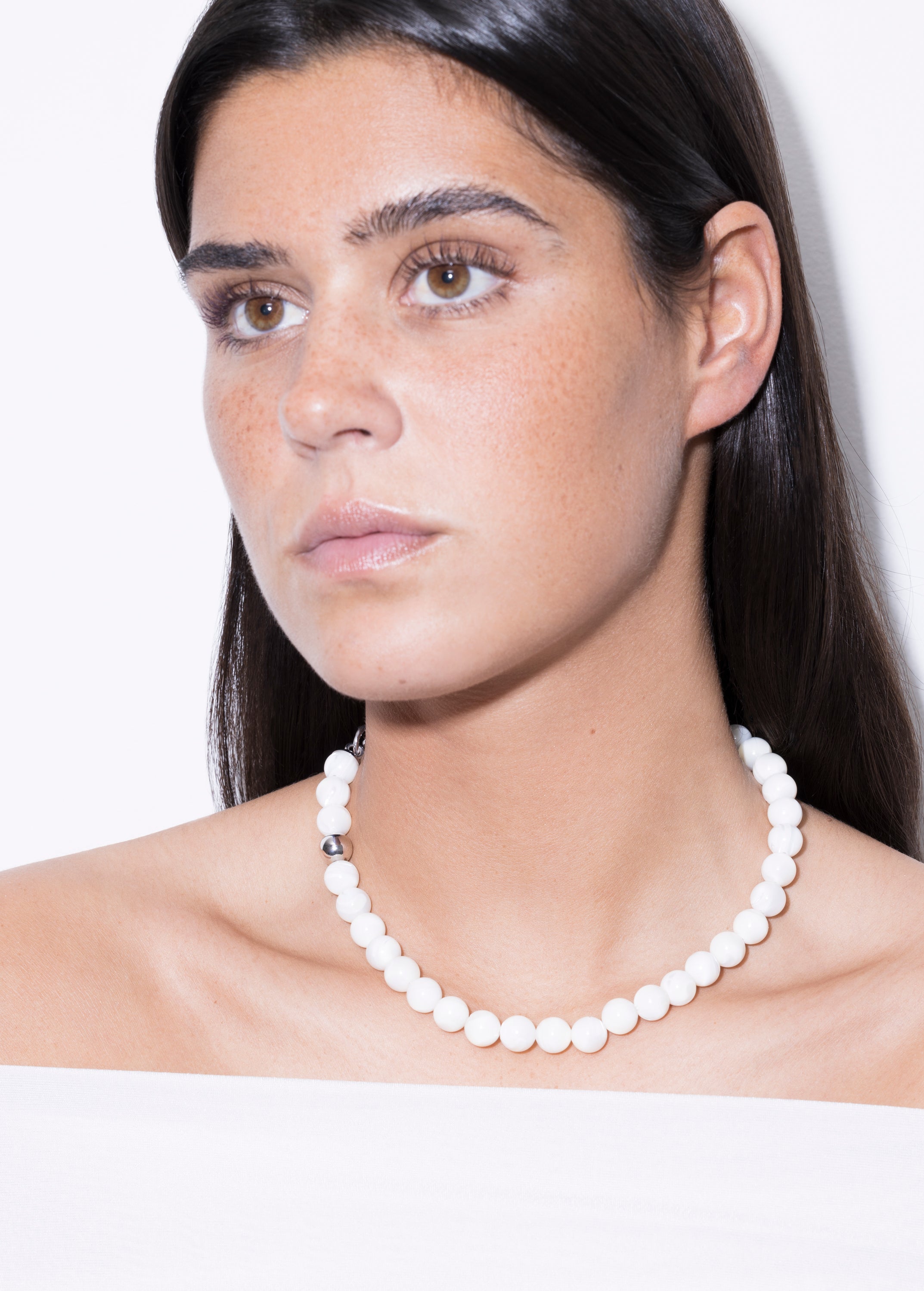 model wearing nacre collar