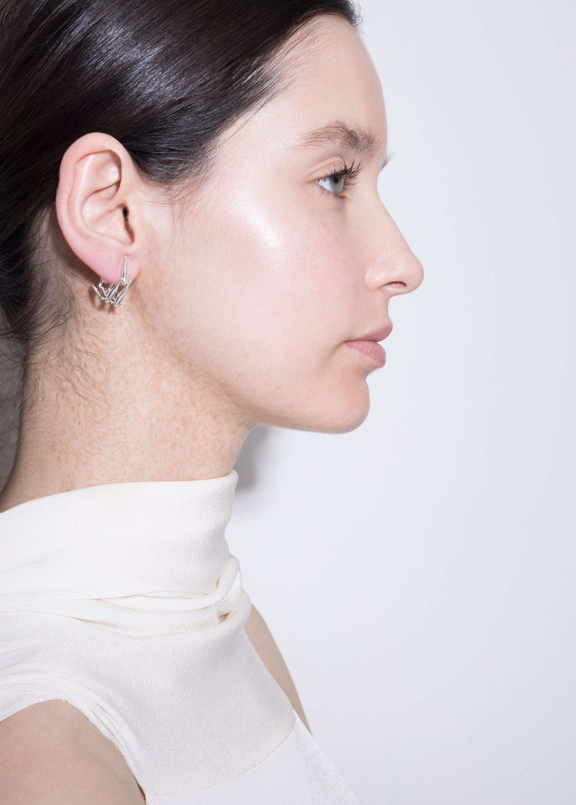 model wearing tereza huggies in silver