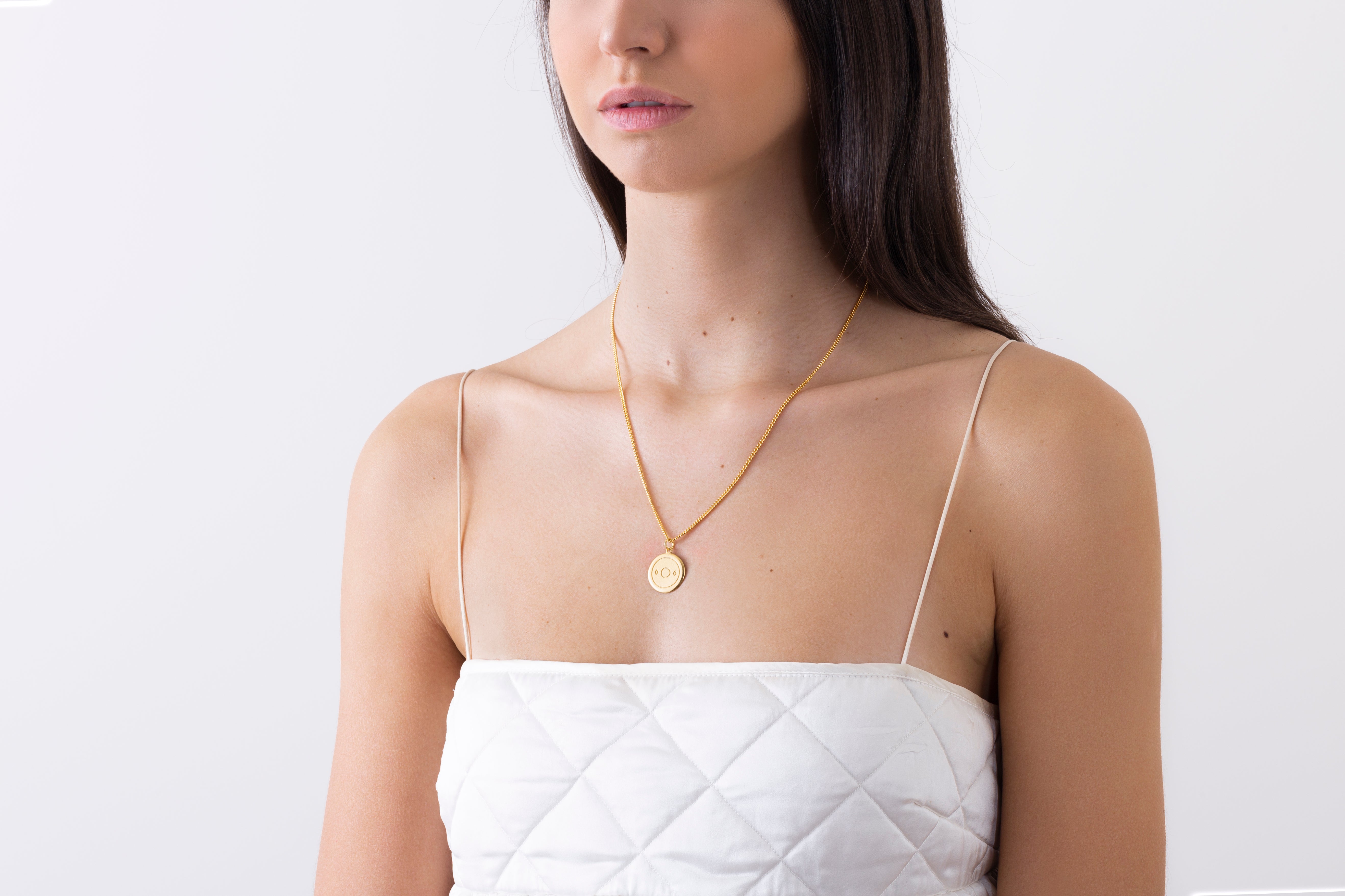 model wearing bree necklace in gold