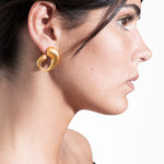 model wearing camille earrings in gold