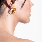 model wearing camille earrings in gold