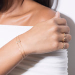 model wearing chris bracelet 18k diamond and hannah bracelet 18k diamond