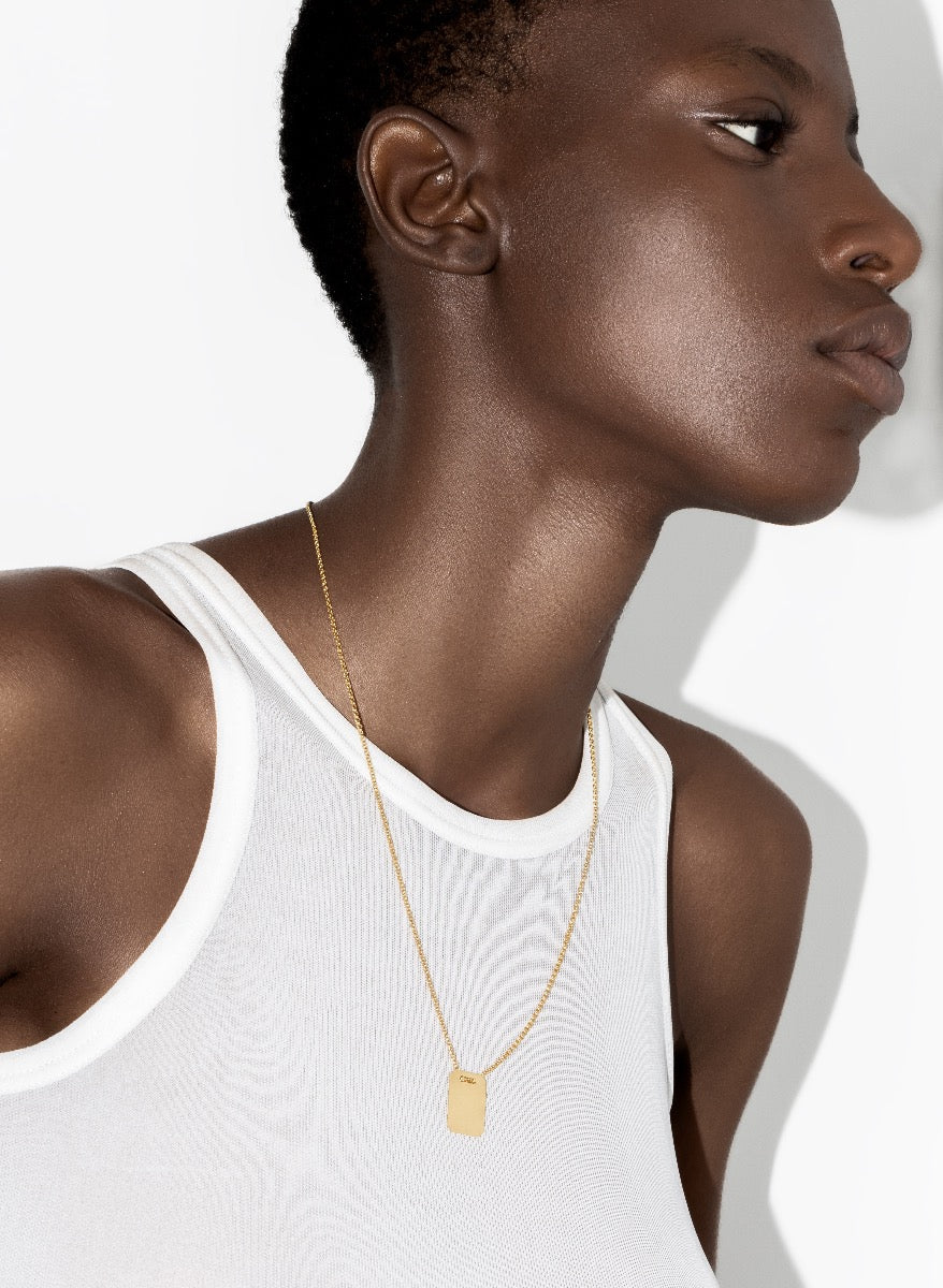 model wearing eva necklace in gold