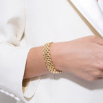 model wearing gala bracelet in gold