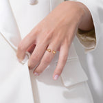 model wearing hit ring in gold