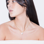 model wearing klein necklace in gold