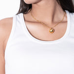 model wearing pamela necklace in gold