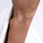 model wearing pear necklace 18k diamond