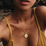 model wearing ginger necklace in gold