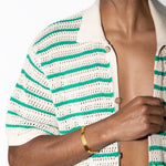 model wearing tag jerome bracelet in gold