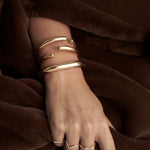 model wearing arlo bracelet in gold